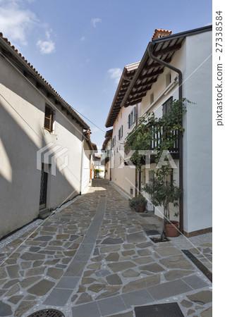 Narrow old street in Smartno village, Slovenia. Narrow old street in Smartno village, Slovenia. 27338584