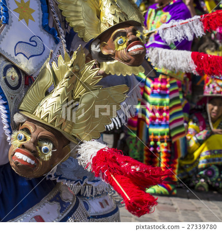 Peruvian dancers at the parade in Cusco. People in Peruvian dancers at the parade in Cusco. People in 27339780