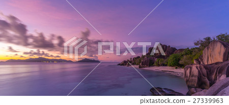 Dramatic sunset at Anse Source d'Argent beach, La 27339963