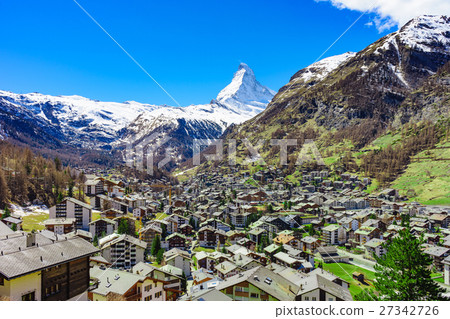 Zermatt village and Matterhorn Peak in background. Zermatt village and Matterhorn Peak in background. 27342726