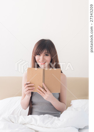 blurred motion young sexy asian woman on white bed blurred motion young sexy asian woman on white bed 27343209