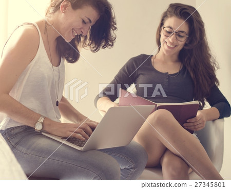 Lesbian Couple Together Indoors Concept Lesbian Couple Together Indoors Concept 27345801