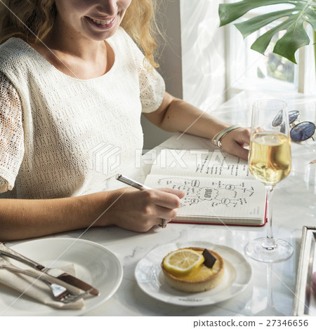 Young Woman Writing Diary Concept 27346656