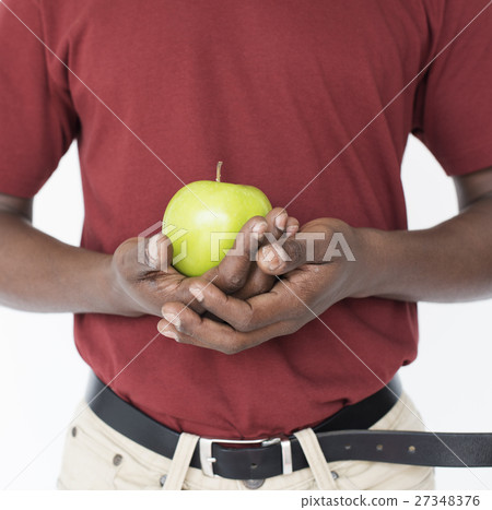 African Man Holding Apple Fruit Nutrition Concept African Man Holding Apple Fruit Nutrition Concept 27348376