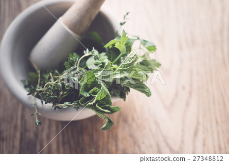 herbs in mortar herbs in mortar 27348812