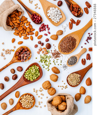Various legumes and different kinds of nutshell. 27348888