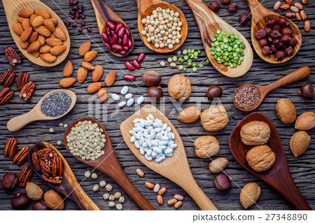 Various legumes and different kinds of nutshell. 27348890