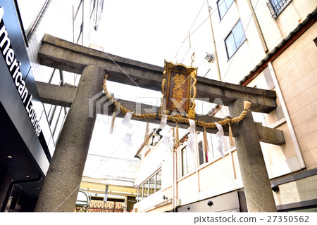 The torii of Nishiki Tenman-gu shrinking into the Kyoto Nishiki-dori building The torii of Nishiki Tenman-gu shrinking into the Kyoto Nishiki-dori building 27350562
