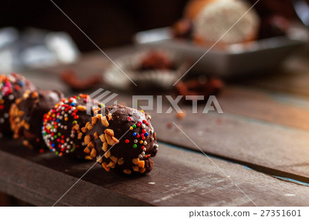 Chocolate ball on a wooden. 27351601