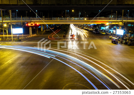 Bangkok at night, light and dark on the road. 27353063