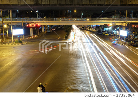 Bangkok at night, light and dark on the road. 27353064