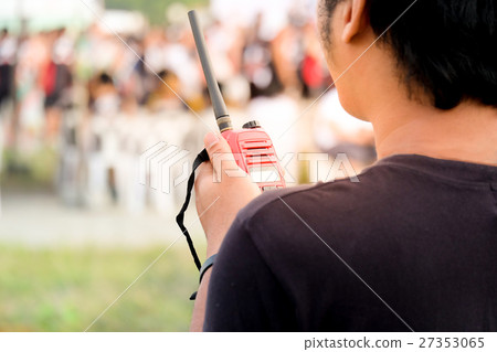 Man with a Walkie Talkie for communication Man with a Walkie Talkie for communication 27353065