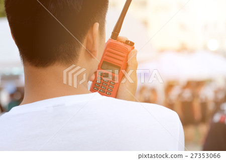 Man with a Walkie Talkie for communication Man with a Walkie Talkie for communication 27353066