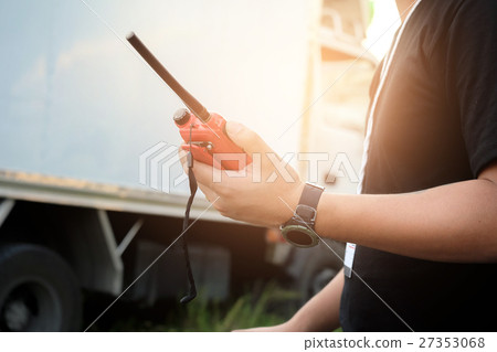 Man with a Walkie Talkie for communication  27353068