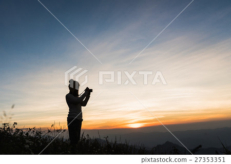 Photographer Silhouettes On Cliff Twilight Sky 27353351