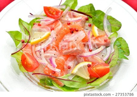 Carpaccio, red snapper and salmon trout carpaccio (Italian). Pouring olive oil. 27353786