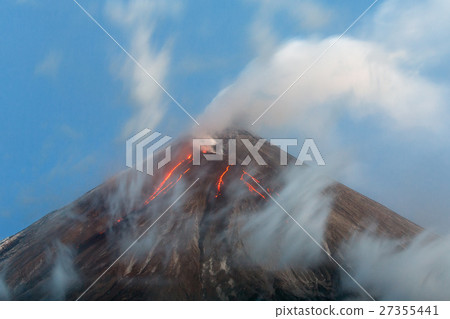 Volcanic eruption - lava flows from crater volcano Volcanic eruption - lava flows from crater volcano 27355441