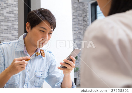 Meals discontented while watching smart husband couple cheerful eating meal food feeling 27358801
