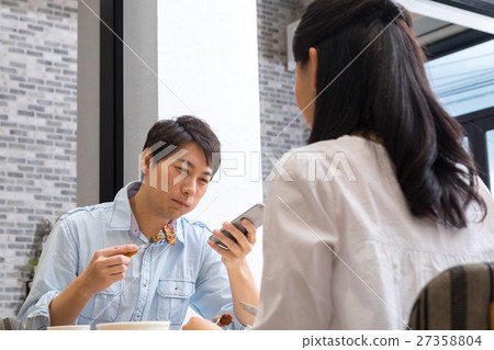 Meals discontented while watching smart husband couple cheerful eating meal food feeling Meals discontented while watching smart husband couple cheerful eating meal food feeling 27358804