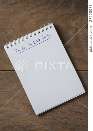 blank notepad on wooden table with phrase to do in blank notepad on wooden table with phrase to do in 27358971