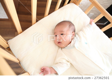 A baby sleeping in a baby bed 1.5 months after birth (50th birthday) A baby sleeping in a baby bed 1.5 months after birth (50th birthday) 27362501