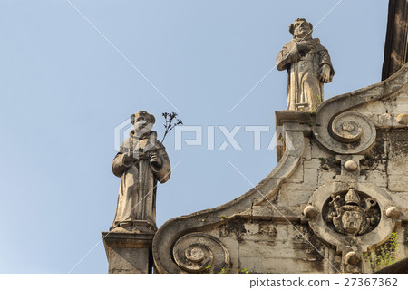 Sculptures on the roof of the catholic church Sculptures on the roof of the catholic church 27367362