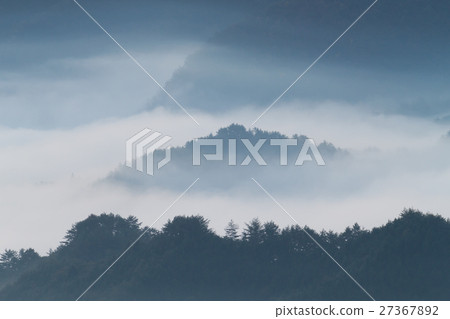 Mountains covered with haze Mountains covered with haze 27367892