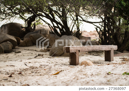 empty wooden bench at the beach empty wooden bench at the beach 27368097