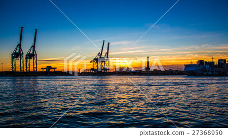 sunset at Genoa's port, silhouette of the Lanterna sunset at Genoa's port, silhouette of the Lanterna 27368950