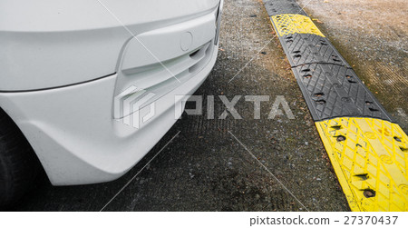 Car with  road bumps for reduce speed. Car with  road bumps for reduce speed. 27370437