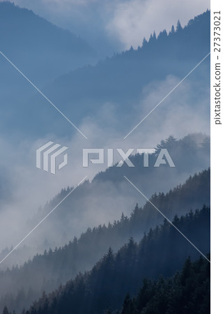 Clouds drifting in the valley 27373021