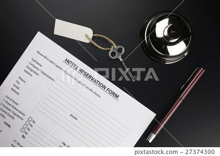 bell and the key at the reception in the hotel 27374300