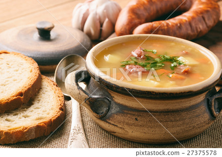 Pea soup with smoked sausage. Pea soup with smoked sausage. 27375578