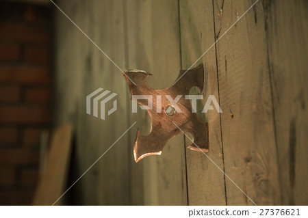 An asterisk ninja in the wall 27376621