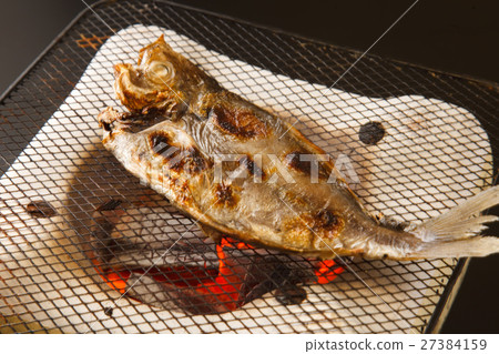 Erying dried fish 27384159