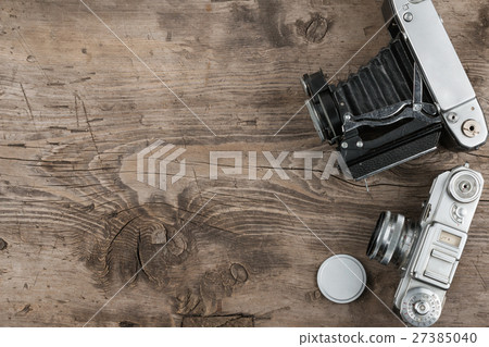 Nostalgic background, old photo cameras Nostalgic background, old photo cameras 27385040