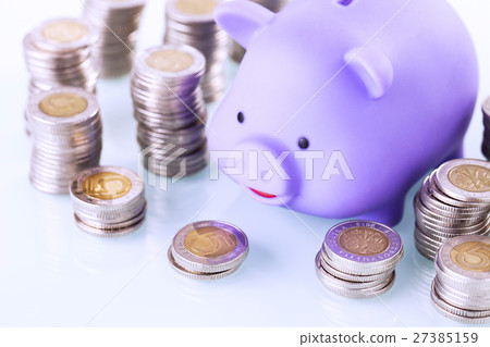 Piggy bank and money on white background 27385159