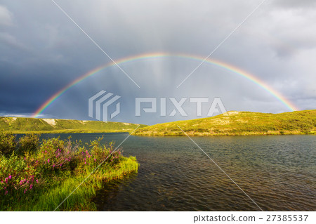 Rainbow in mountains Rainbow in mountains 27385537