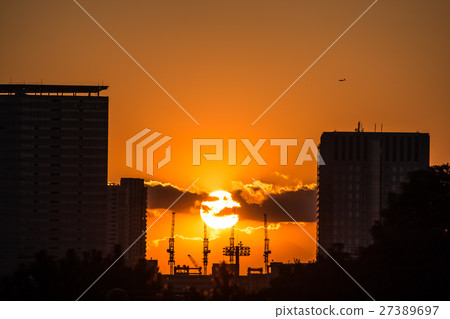 sunset between silhouette of building at Odaiba 27389697