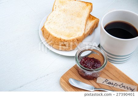 Breakfast toasts, raspberry jam, black coffee Breakfast toasts, raspberry jam, black coffee 27390401