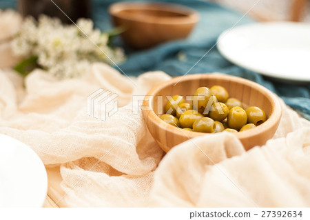 green olives on fabric background. green olives on fabric background. 27392634
