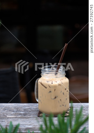 Ice coffee glasses on wood table Ice coffee glasses on wood table 27392745