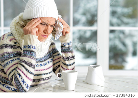woman with headache sitting in cafe woman with headache sitting in cafe 27394310