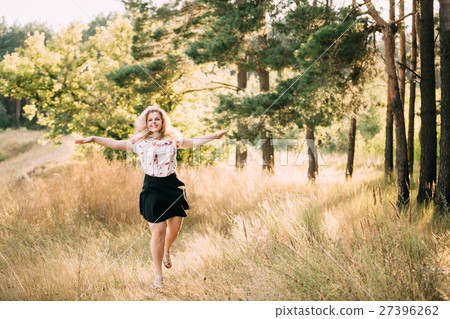 Young Pretty Plus Size Caucasian Happy Smiling Young Pretty Plus Size Caucasian Happy Smiling 27396262