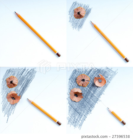 Pencil sharpener shavings on the white paper. Back 27396538