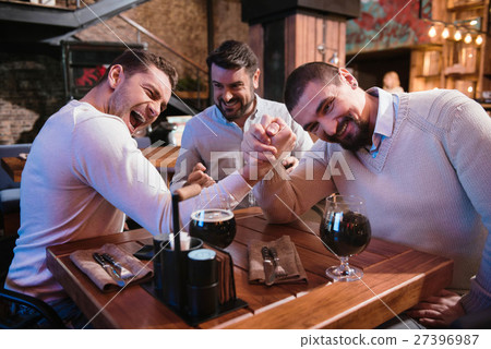 Positive nice men deciding who is stronger Positive nice men deciding who is stronger 27396987