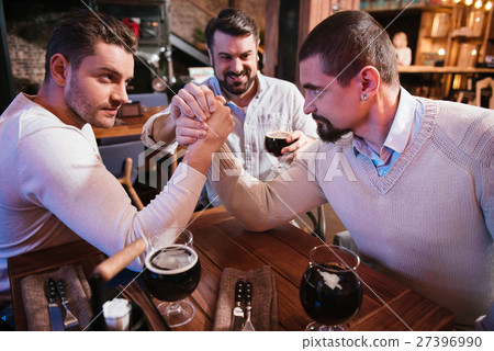 Handsome brutal men confronting each other Handsome brutal men confronting each other 27396990
