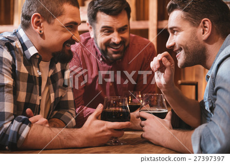 Joyful smiling man telling an interesting story 27397397