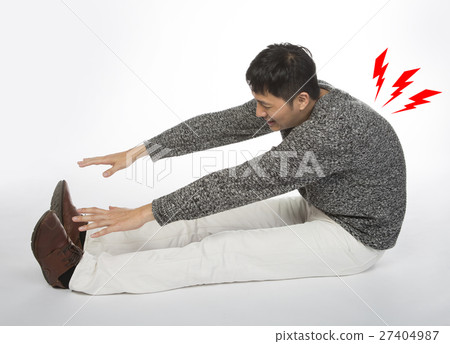 Man sits and bends forward Man sits and bends forward 27404987