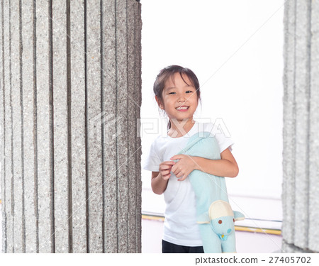 Adorable little girl playing peekaboo 27405702